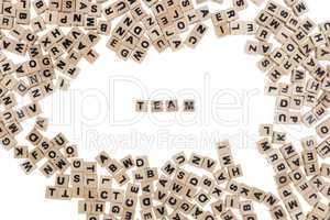 Team written in small wooden cubes
