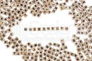 university written in small wooden cubes