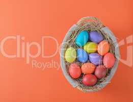 colorful easter eggs in a basket