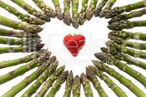 Strawberry Amidst A Heart Made Of Asparagus Spears