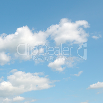 white clouds on a blue sky background