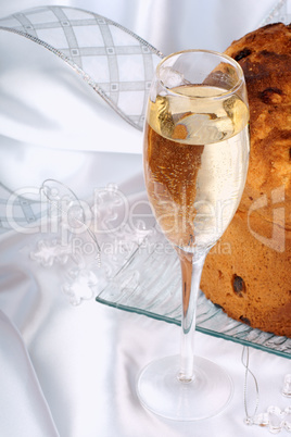 Italian Christmas composition with panettone and spumante