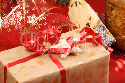 Christmas composition with present and panettone