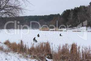 fishermen in the winter fishing