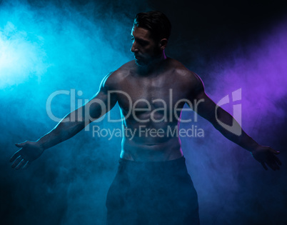 Silhouette Shirtless Muscled Man Posing in Smoke