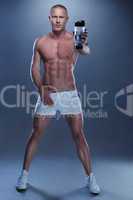 Shirtless Athletic Young Man Holding Water Bottle