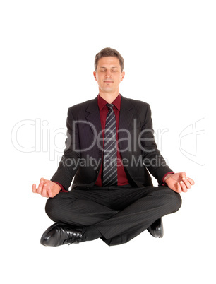 Businessman doing yoga.