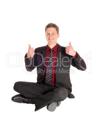 Businessman with thumb up.