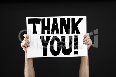 Man holding poster with thank you