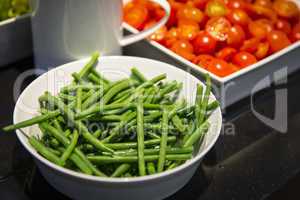 Kochzutaten Grüne Bohnen und Tomaten