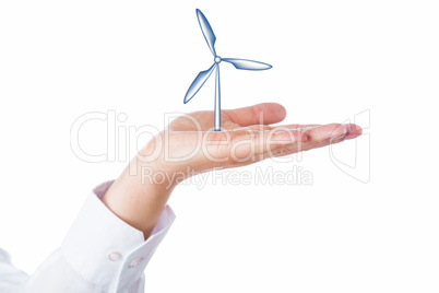 Wind Turbine Rising In The Palm Of A Hand