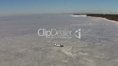 Hovercraft Moves on the Frozen Lake, aerial view