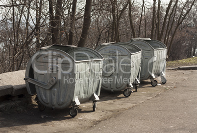 Old metal garbage trash container refuse bin