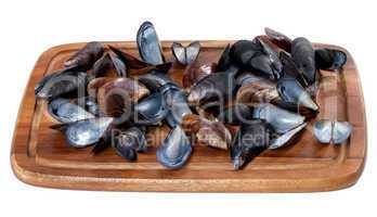 Shells of mussels on wooden board