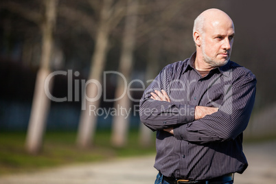 Confident attractive man standing waiting