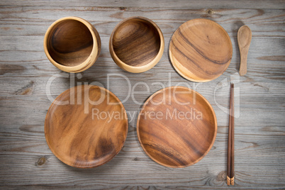Various design empty plates on wood desk