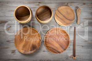 Various design empty plates on wood desk