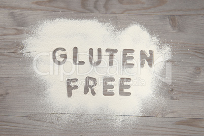 Word gluten free written in white flour