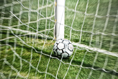 Soccer ball inside the goal line