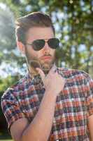 Handsome hipster wearing sunglasses