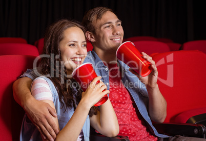 Young couple watching a film