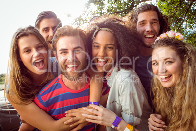Happy hipsters smiling at camera