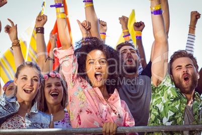 Excited young people singing along