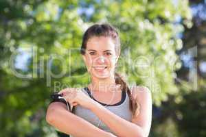 Fit brunette on a run in the park