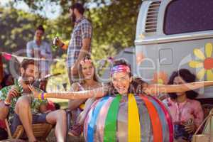 Happy hipsters having fun on campsite