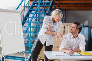 Focused warehouse managers during a presentation