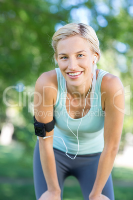 Pretty blonde jogging at the park
