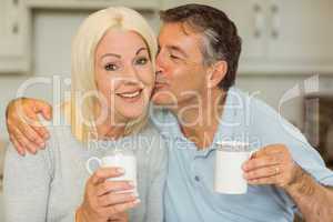 Mature couple having coffee together