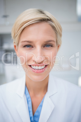 Close-up of female doctor smiling