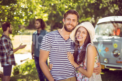 Hipster couple smiling at camera