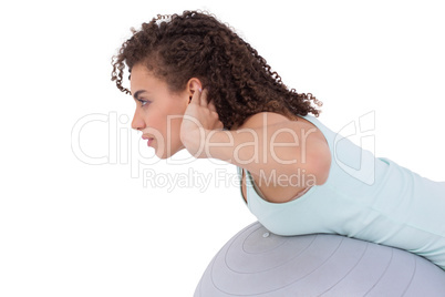 Fit woman wokring out on exercise ball