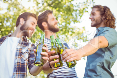 Hipster friends having a beer together