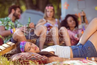 Happy hipsters relaxing on the campsite