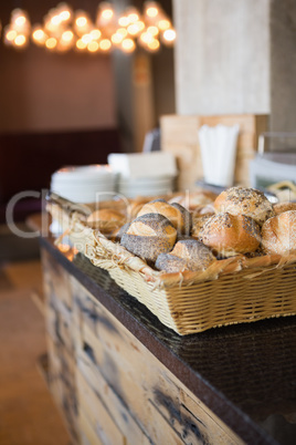 Basket with fresh and delicious roll of bread