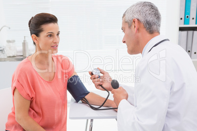 Doctor doing test at his patient