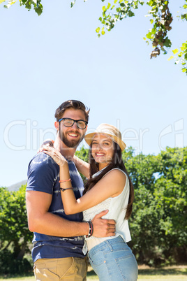 Hipster couple smiling at camera