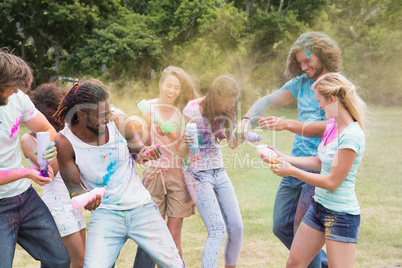 Friends having fun with powder paint