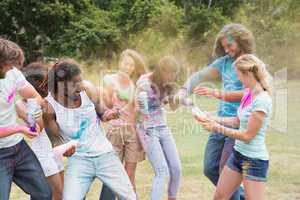 Friends having fun with powder paint