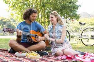 Cute couple having a picnic