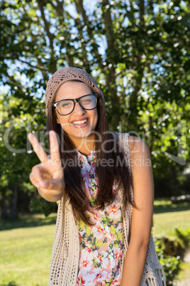 Pretty hipster smiling at camera