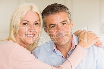 Happy mature couple smiling together