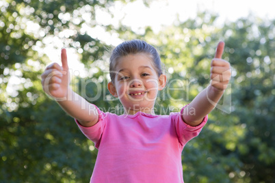 Happy little girl smiling at camera