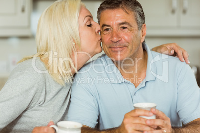 Mature couple having coffee together