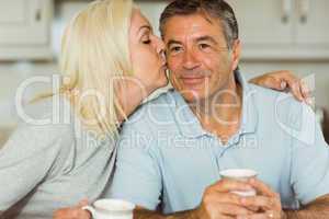 Mature couple having coffee together