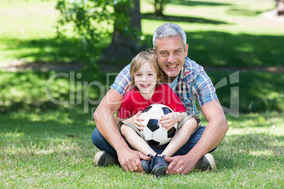 Happy father with his son at the park