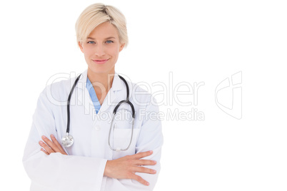 Blonde doctor smiling at camera